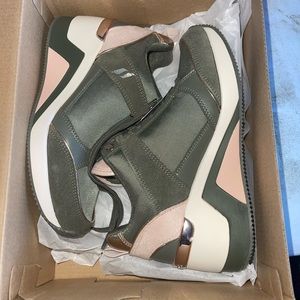 Woman’s Skechers Street Million-High N Fly Sneakers